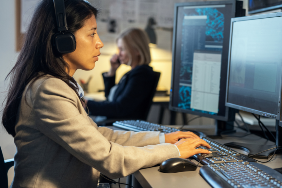 Law enforcement team investigating using computer and tech